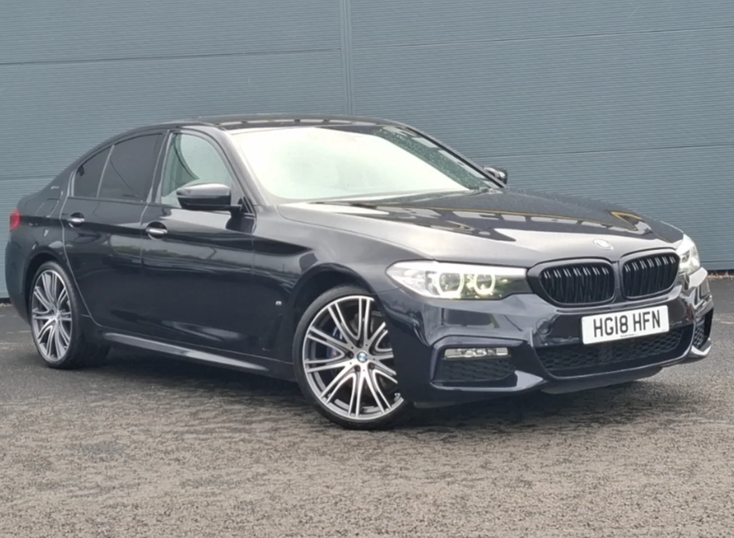 Black BMW 530e M Sport front three-quarter view